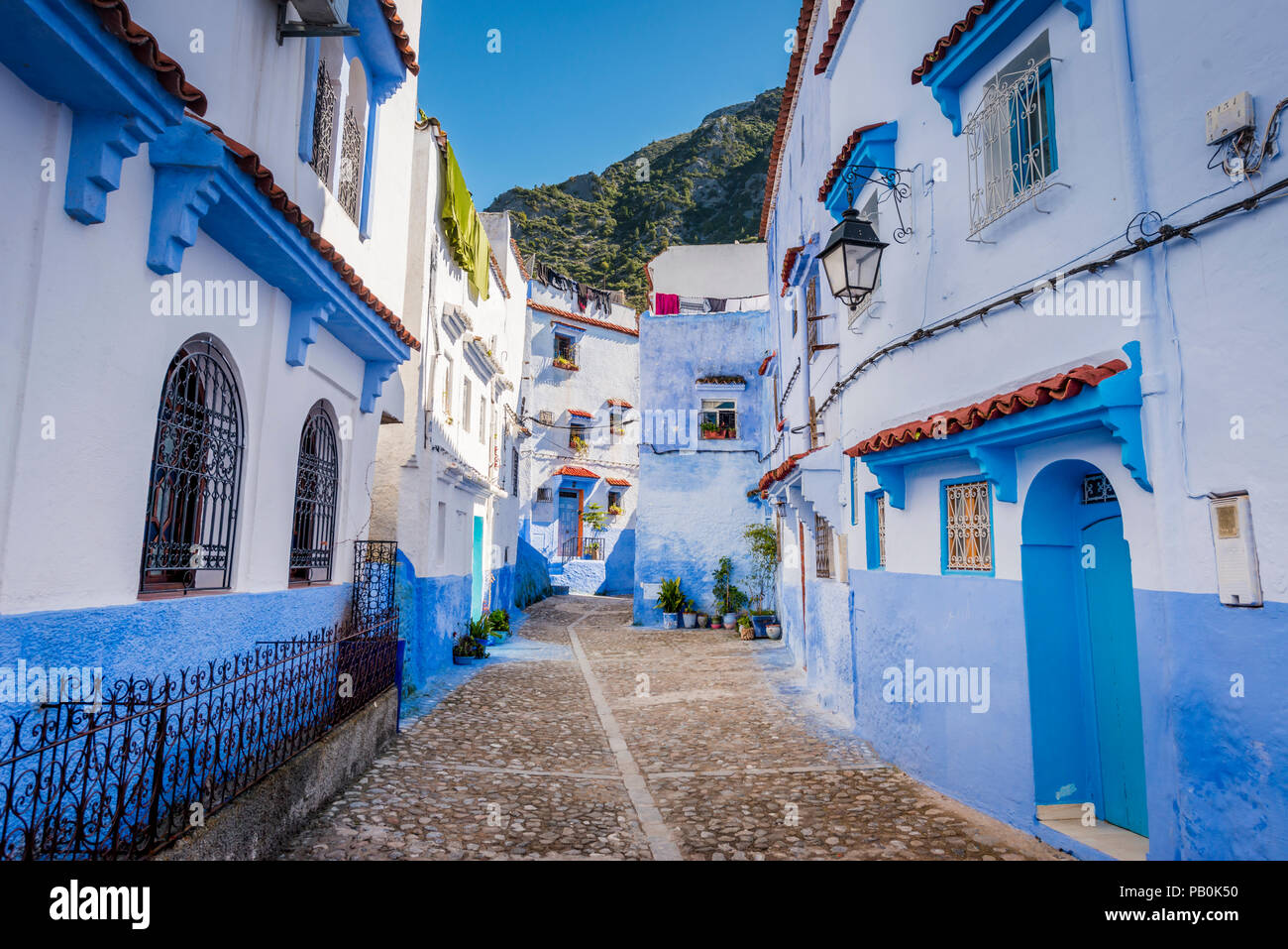 Narrow alley, blue houses, medina of Chefchaouen, Chaouen, Tangier