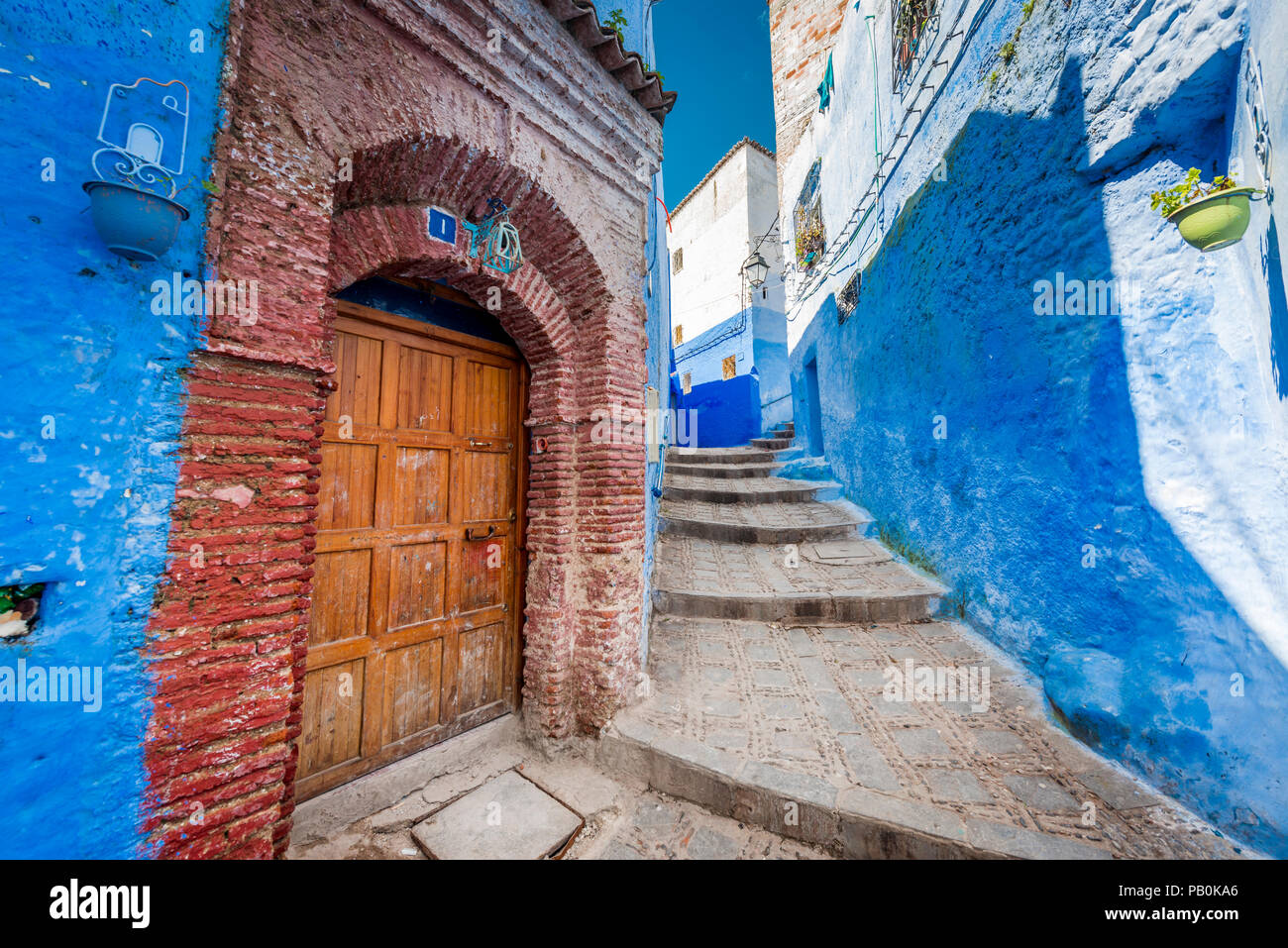 Narrow alley, blue houses, medina of Chefchaouen, Chaouen, Tangier
