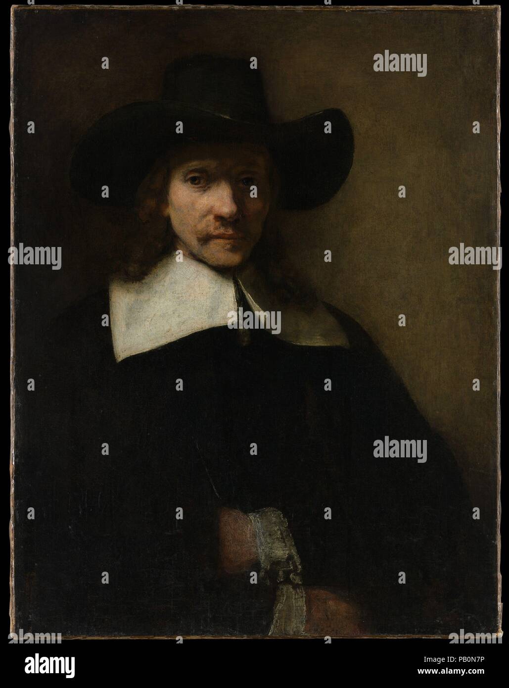 Portrait of a Man. Artist: Rembrandt (Rembrandt van Rijn) (Dutch, Leiden 1606-1669 Amsterdam). Dimensions: 32 7/8 x 25 3/8 in. (83.5 x 64.5 cm). Date: ca. 1655-60.  This portrait is generally considered to be by Rembrandt, and is somewhat less uniformly thought to date from the 1650s. Both questions are made more difficult by the condition of the picture: the hands, the body, and the hat are badly abraded. The face is fairly well preserved. Museum: Metropolitan Museum of Art, New York, USA. Stock Photo