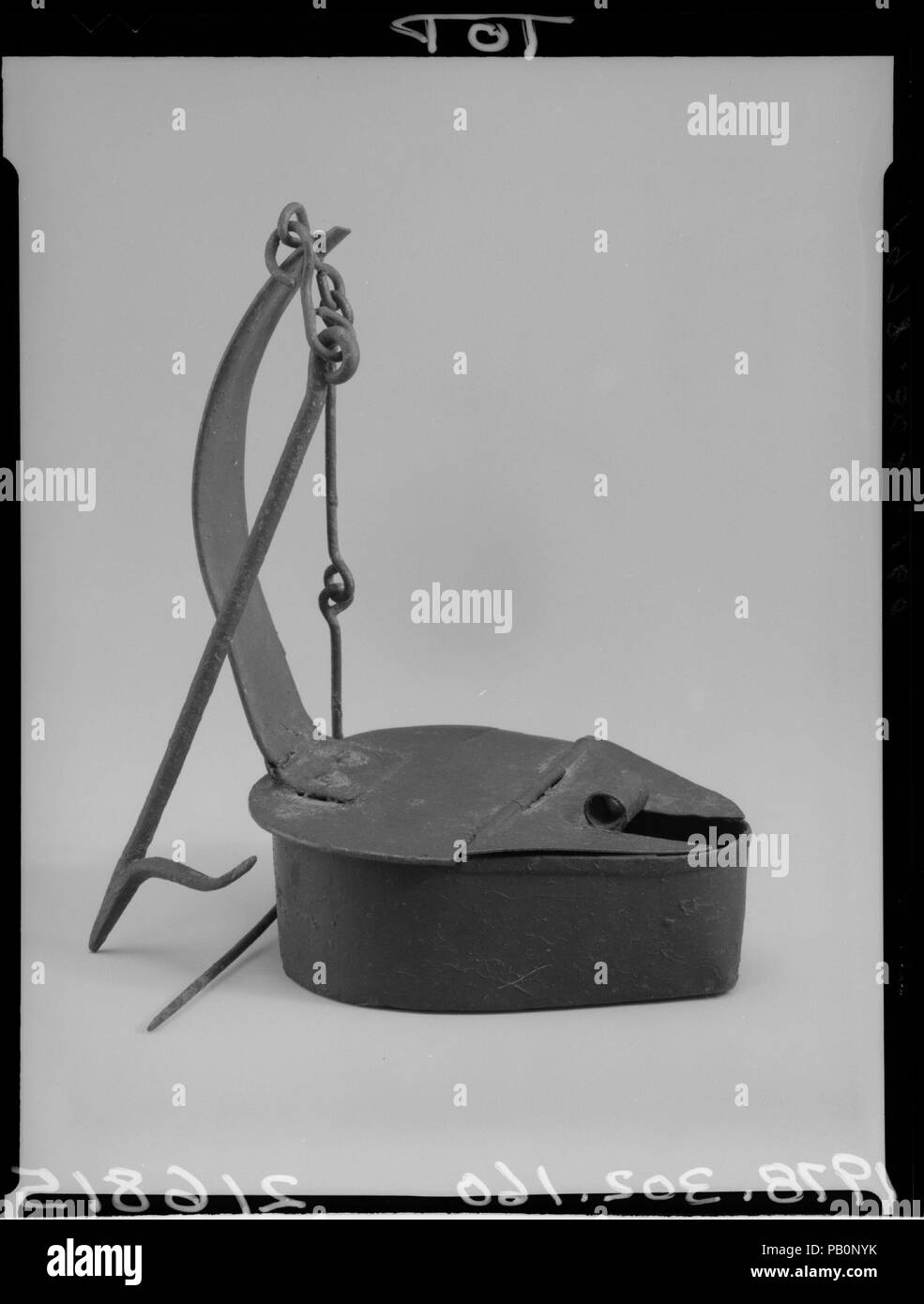 Betty Lamp. Dimensions: H. 4 1/2 in. (11.4 cm). Date: 1700-1800. Museum: Metropolitan Museum of Art, New York, USA. Stock Photo