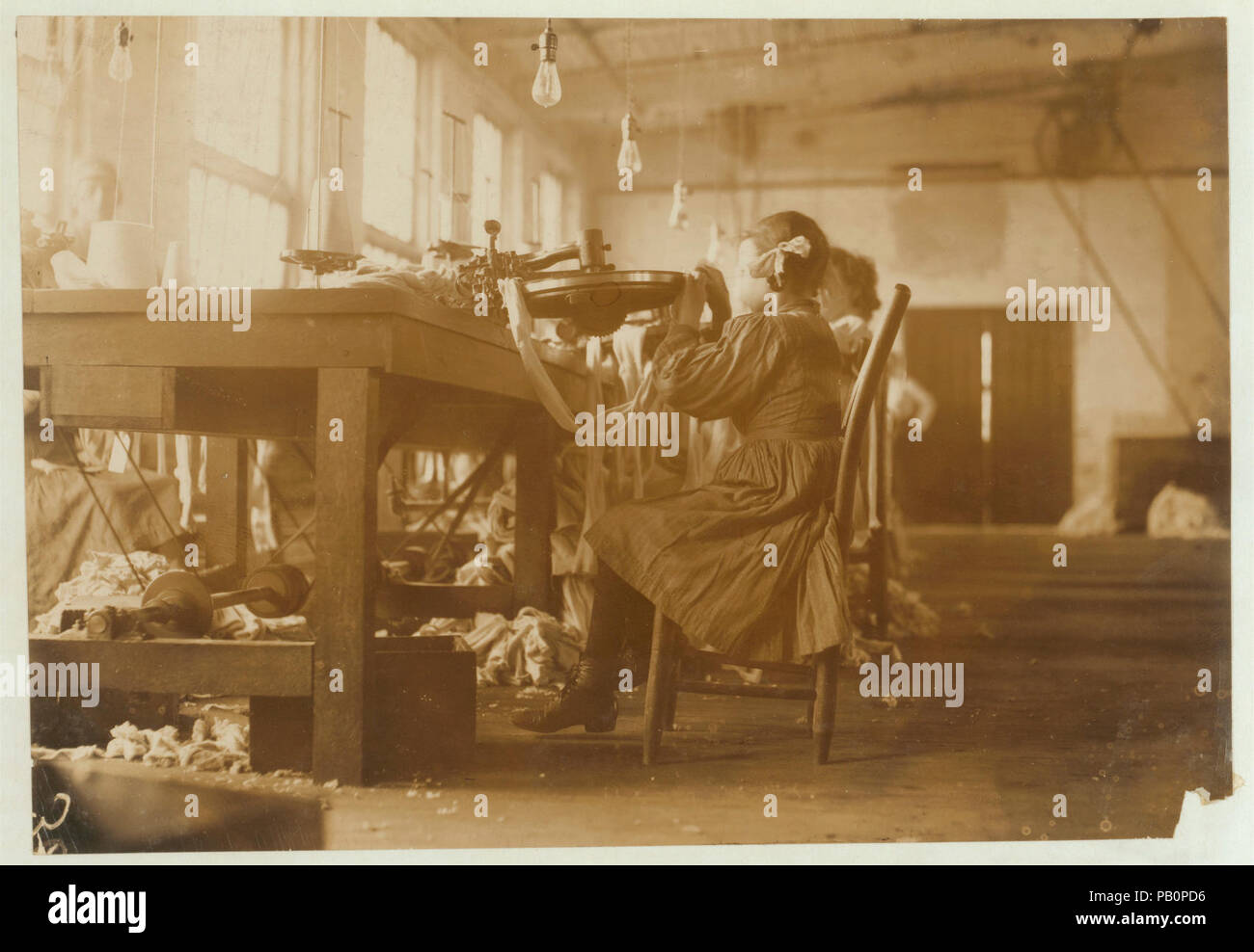 A young raveler in London Hosiery Mills. Stock Photo
