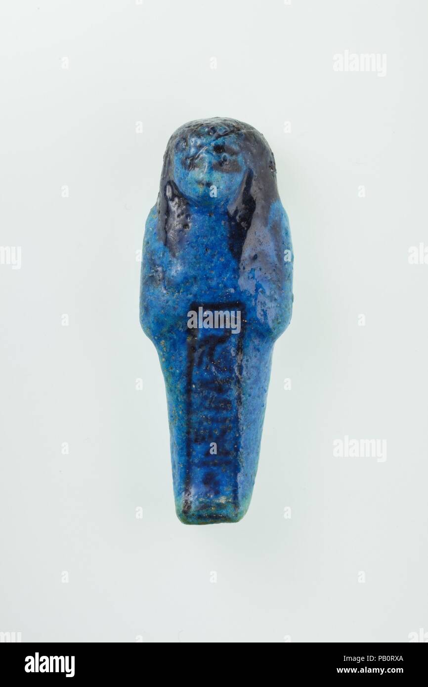 Worker Shabti of Nany. Dimensions: H. 8.8 × W. 3.3 × D. 2.1 cm (3 7/16 × 1 5/16 × 13/16 in.). Dynasty: Dynasty 21. Reign: reign of Psusennes I. Date: ca. 1050 B.C..  See 30.3.27.1a, b. Museum: Metropolitan Museum of Art, New York, USA. Stock Photo