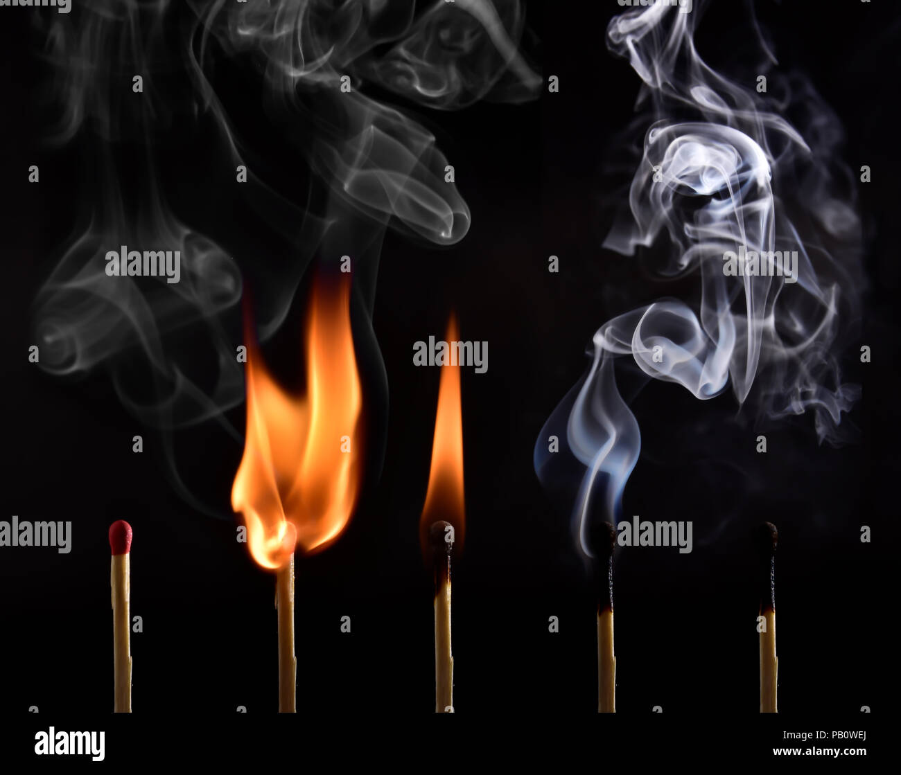 Sequence of ignition of a matchstick from lighting to being blown up and capturing the beautiful drawings made by the smoke. Done on black background Stock Photo