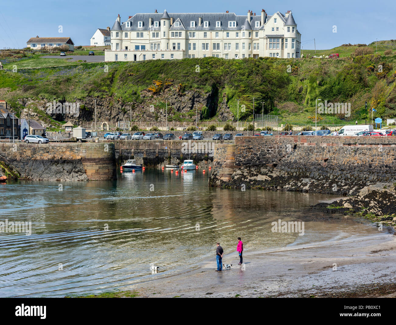 Portpatrick harbour with the Portpatrick Hotel in the background Stock Photo