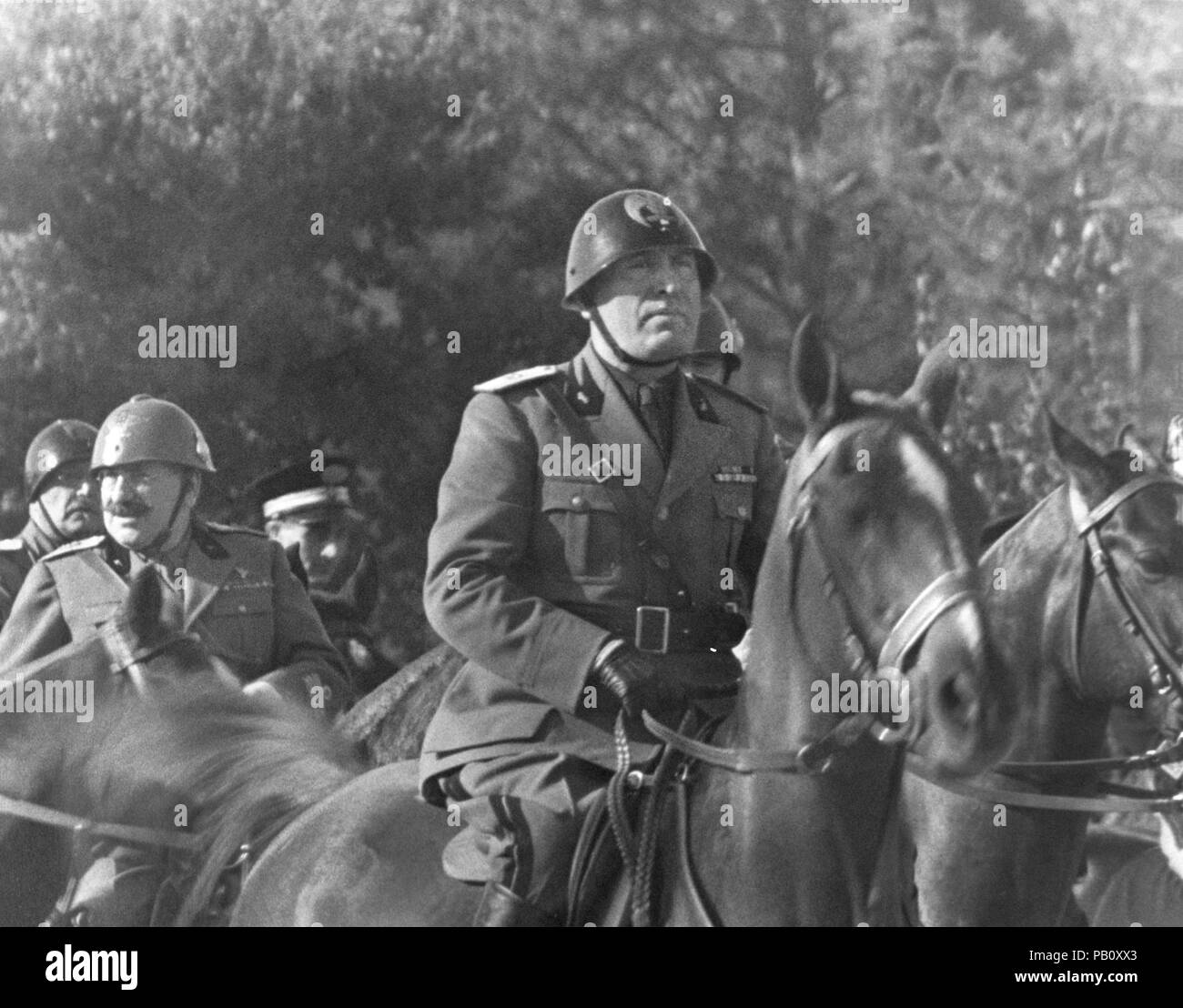 Benito Mussolini, on horseback, during Parade honoring Birthday of King Victor Emmanuel III, Rome, Italy, November 20, 1935 Stock Photo
