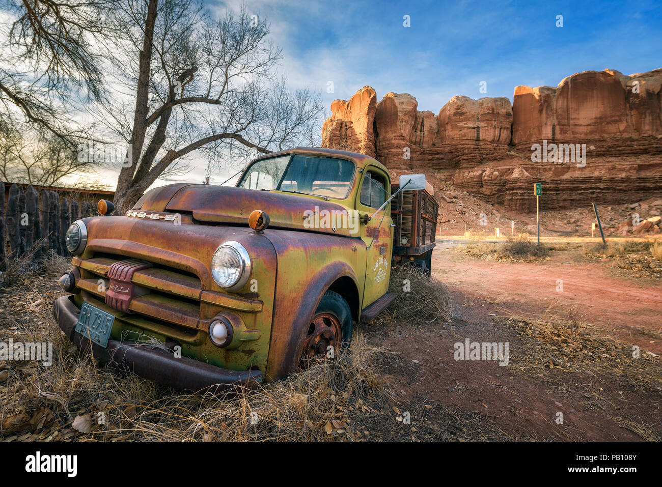 Deserted Dodge pickup vehicle parked near Twin Rocks in Utah Stock Photo