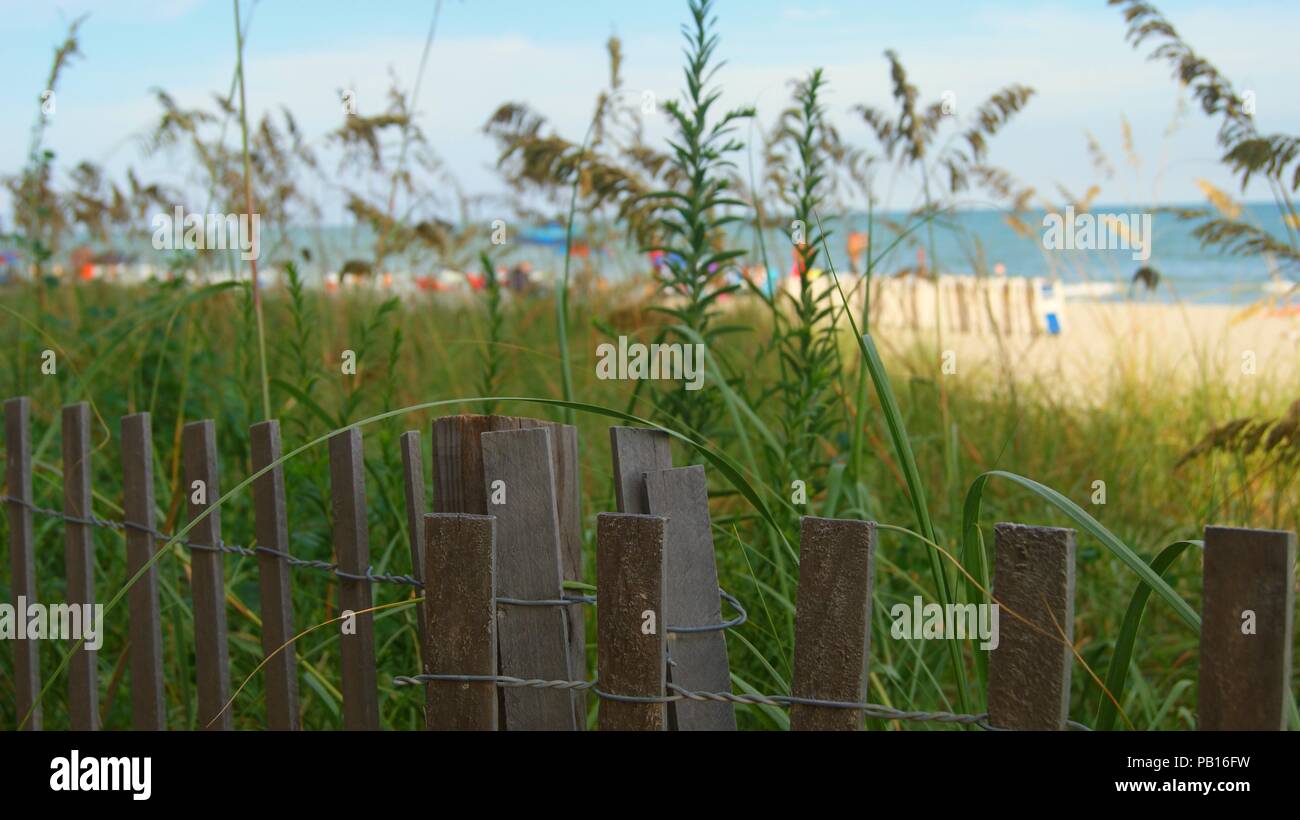 Fence On The Beach Stock Photo - Alamy