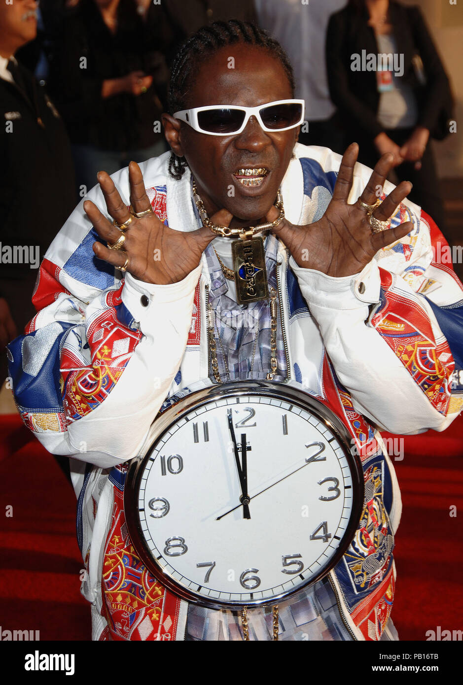 Flavor Flav arriving at American Music Awards ( AMA ) at the Shrine Auditorium in Los Angeles.  3/4 huge clock sun glass eye contact 08 FlavorFlav042 Red Carpet Event, Vertical, USA, Film Industry, Celebrities,  Photography, Bestof, Arts Culture and Entertainment, Topix Celebrities fashion /  Vertical, Best of, Event in Hollywood Life - California,  Red Carpet and backstage, USA, Film Industry, Celebrities,  movie celebrities, TV celebrities, Music celebrities, Photography, Bestof, Arts Culture and Entertainment,  Topix, vertical, one person,, from the years , 2006 to 2009, inquiry tsuni@Gamma Stock Photo