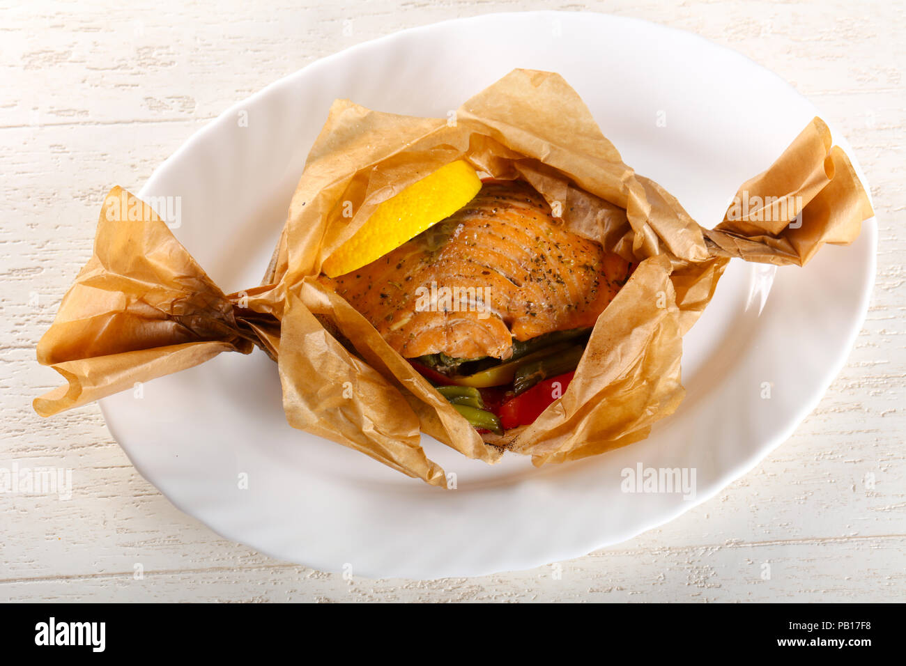 Baked salmon with vegetables Stock Photo - Alamy