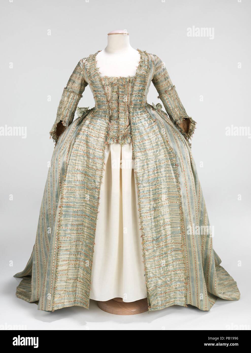 Robe à la Française. Culture: French. Date: ca. 1780. The striped textile  here is indicative of the change in aesthetics around 1765 to a more  neoclassical taste, less florid than the silks