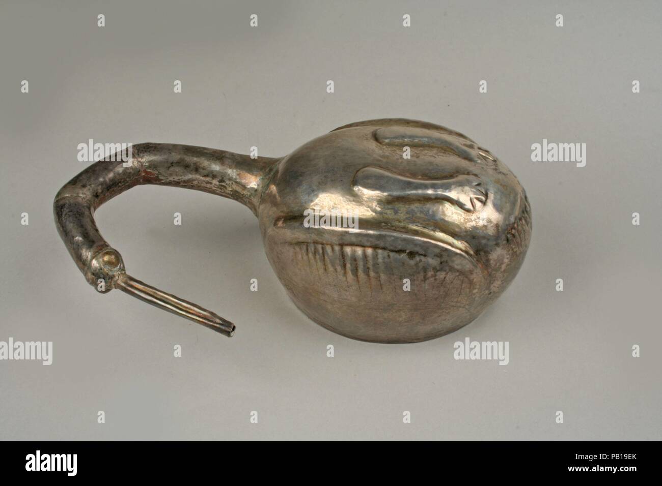 Silver Bird Vessel. Culture: Peru (?). Dimensions: H. 5 3/8 x W. 3 1/2 x D. 2 in. (13.7 x 8.9 x 5.1cm). Date: A.D. 900-1470. Museum: Metropolitan Museum of Art, New York, USA. Stock Photo