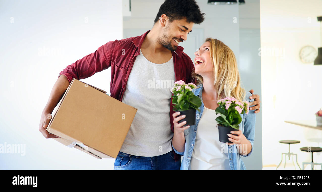 Beautiful couple happy for their new home Stock Photo - Alamy