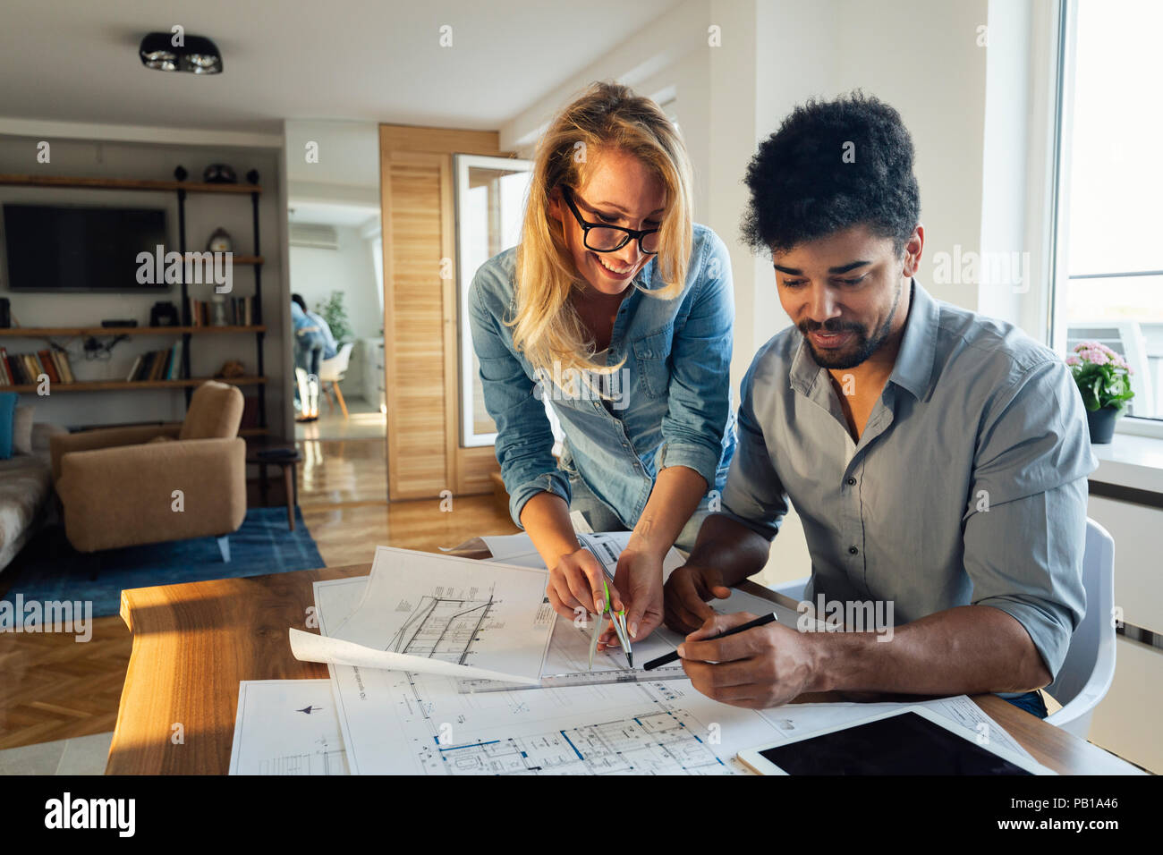 Architect colleagues working in office Stock Photo