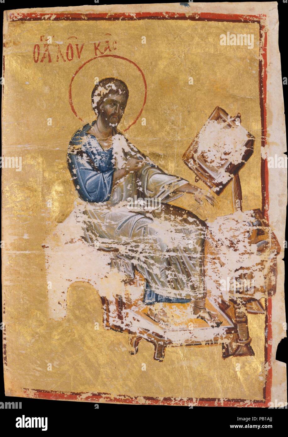 Manuscript Illumination with the Evangelist Luke. Culture: Byzantine. Dimensions: 5 13/16 x 4 1/16 in.  (14.7 x 10.3 cm). Date: late 13th-early 14th century.  On a single page from a gospel book, the illumination shows the evangelist Luke seated on a backless chair, reaching with his left arm toward the open book on a pedestal before him. He wears a loose-fitting blue tunic and white himation, and sandals on his feet. He holds a quill pen in his right hand as he pauses to contemplate the text. His sandaled feet rest on a footstool, next to a small book cabinet that extends beyond the border of Stock Photo