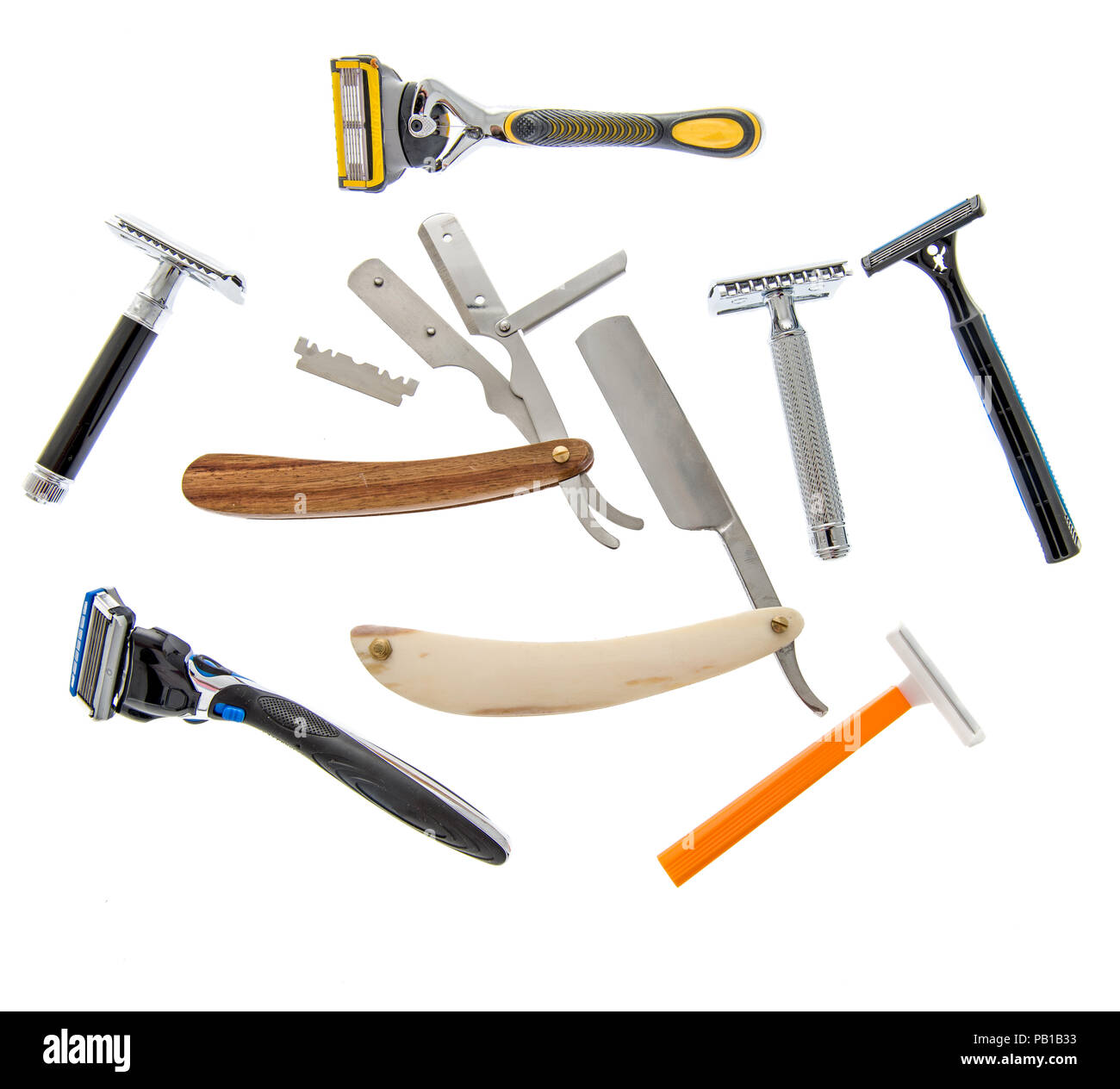 Three different kind of razors including safety, straight and disposable on an isolated background. Stock Photo