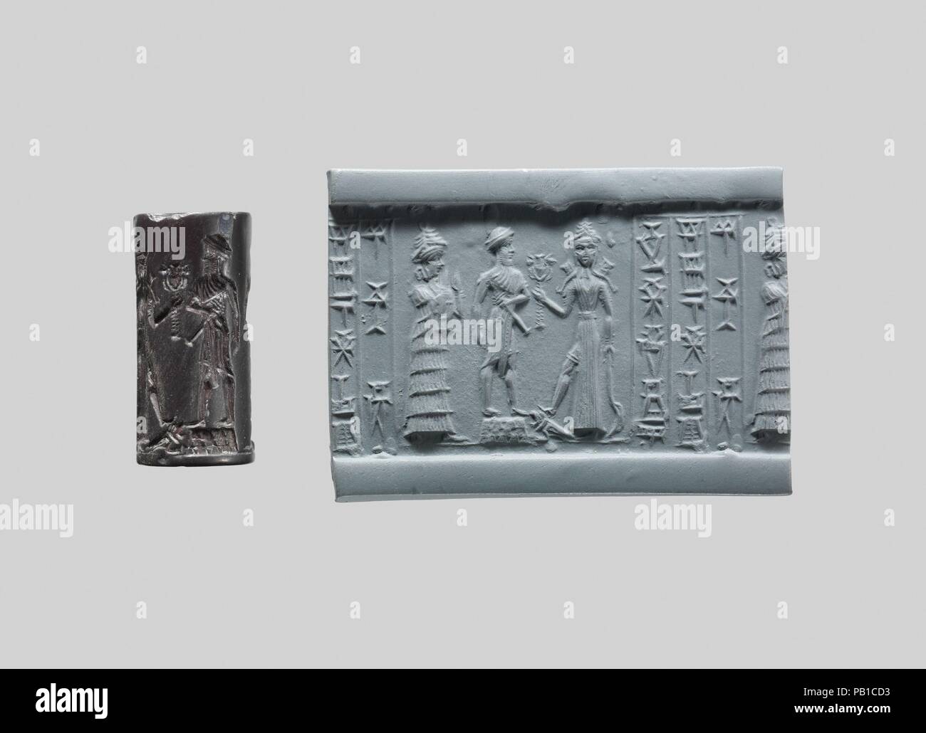 Cylinder seal. Culture: Babylonian. Dimensions: 0.94 in. (2.39 cm). Date: ca. 18th-17th century B.C..  Although engraved stones had been used as early as the seventh millennium B.C. to stamp impressions in clay, the invention in the fourth millennium B.C. of carved cylinders that could be rolled over clay allowed the development of more complex seal designs. These cylinder seals, first used in Mesopotamia, served as a mark of ownership or identification. Seals were either impressed on lumps of clay that were used to close jars, doors, and baskets, or they were rolled onto clay tablets that rec Stock Photo