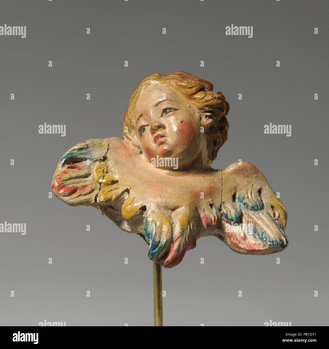 Putto. Culture: Italian. Dimensions: Overall (confirmed): 2 1/2 × 2 3/4 × 1 3/8 in. (6.4 × 7 × 3.5 cm). Date: second half 18th-mid-19th century.  The practice of using crèche figures to restage religious events reached the height of its complexity and artistic excellence in eighteenth-century Naples, and the Metropolitan Museum of Art's group of Neapolitan crèche is one of the finest and most complete survivals of the art form. The ensemble consists of characters traditional to eighteenth-century Italian Christmas holiday customs. The Nativity, featuring the holy family, shepherds and their fl Stock Photo