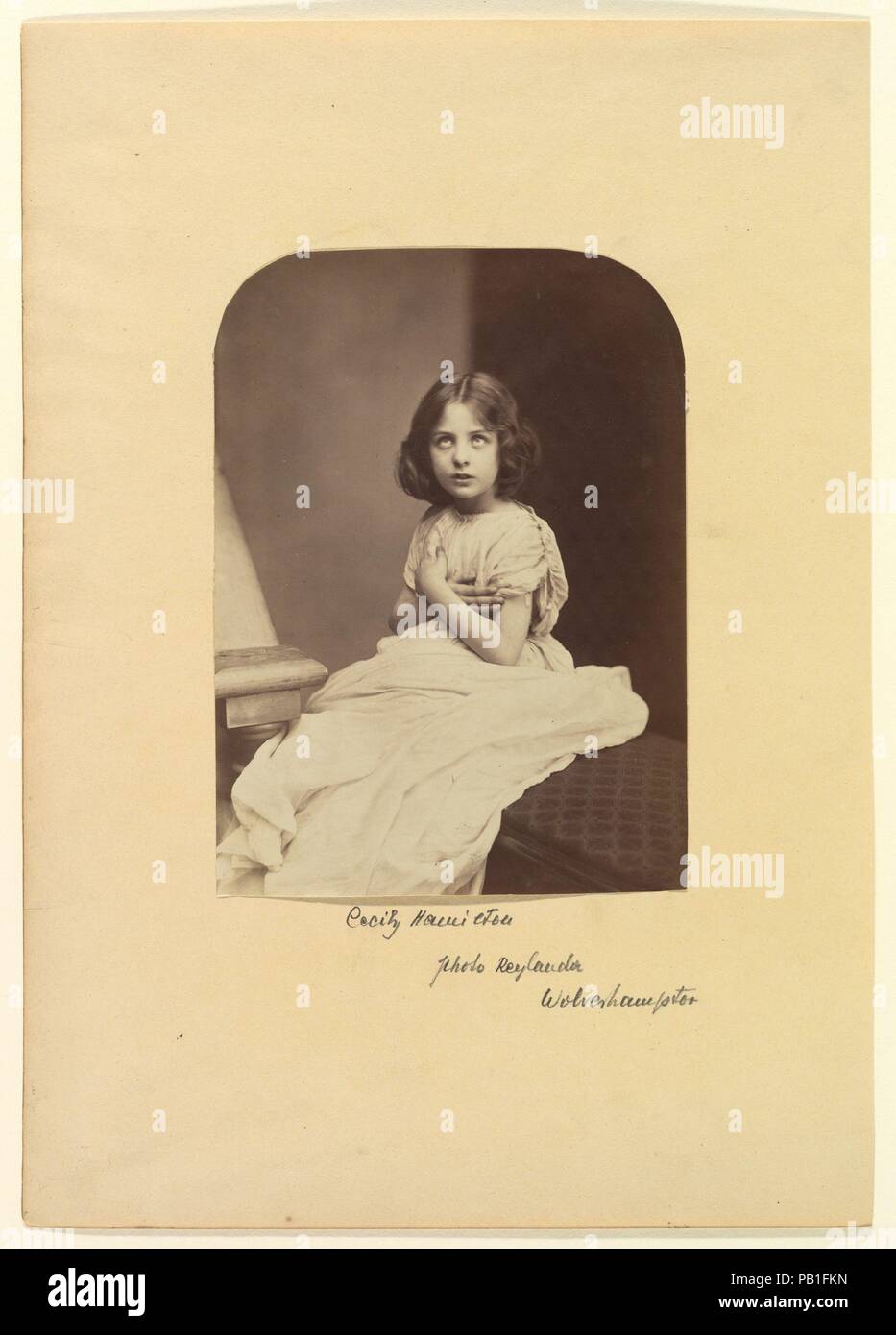 Cecily Hamilton. Artist: Oscar Gustav Rejlander (British, born Sweden, 1813-1875). Date: 1863-1867.  In 1863 Rejlander visited Freshwater on the Isle of Wight. He photographed the family of his friend Alfred, Lord Tennyson as well as the Camerons, and Julia Margaret made prints from copy negatives of Rejlander photographs even before receiving her own camera. Undoubtedly, she knew Rejlander's 'high art' allegorical concoctions as well as his more straightforward but sentimental portraits such as this one. Museum: Metropolitan Museum of Art, New York, USA. Stock Photo