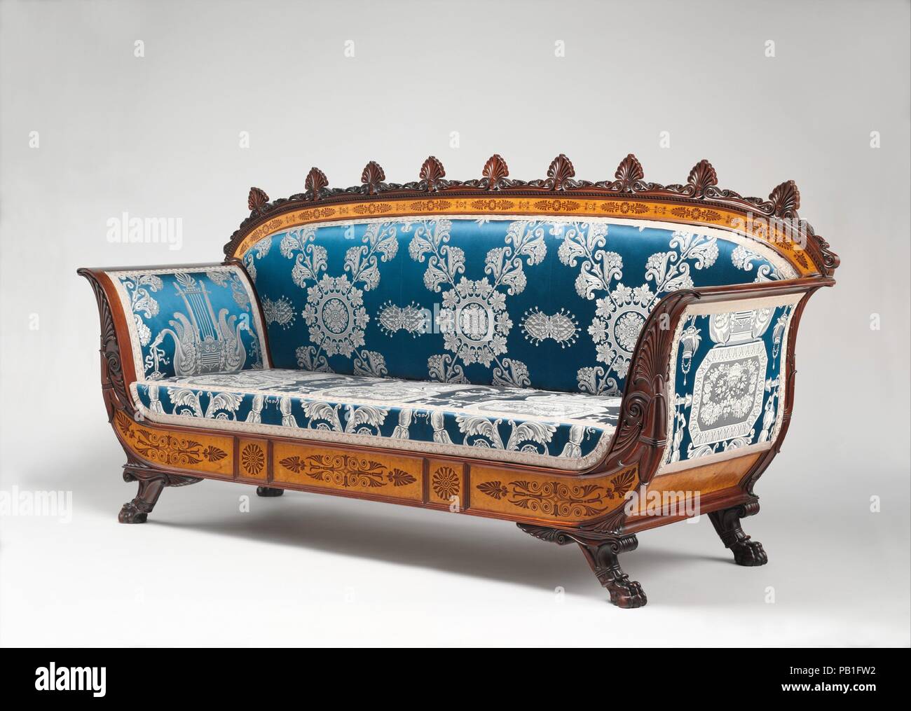 Sofa (part of a set). Culture: Italian, Piedmont. Designer: Designed by Filippo Pelagio Palagi (Italian, Bologna 1775-1860 Turin). Dimensions: 42 1/2 x 90 x 31 1/8 in. (108 x 228.6 x 79.1 cm). Maker: Gabriele Capello ((called Il Moncalvo), Italian, 1806-1876); and Carlo Chivasse. Date: ca. 1835.  This sofa and two armchairs (1987.62.2, .3) are from a set of furniture that also included a daybed, six side chairs, and two additional armchairs. The set was designed by the Bolognese architect Filippo Pelagio Palagi, who in 1832 was commissioned by Carlo Alberto, king of Sardinia, to redecorate his Stock Photo