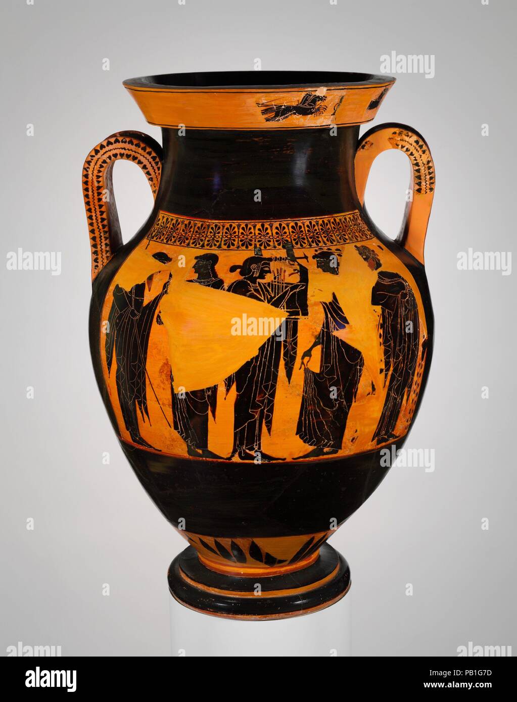 Terracotta amphora (jar). Culture: Greek, Attic. Dimensions: H. 26 in. (66 cm). Date: ca. 530-520 B.C..  Obverse, Athena and Herakles in the gigantomachy (battle of gods and giants)  Reverse, Poseidon, Leto, Apollo, Artemis, Dionysos  On the lip, obverse and reverse, chariot races  Of particular interest on this vase is the frieze of racing chariots on the lip. Subordinate bands of figural decoration were introduced at various times and on various shapes in Athenian vase-painting. At the end of the sixth century B.C. and in the early fifth, decoration on the lip occasionally appears, especiall Stock Photo