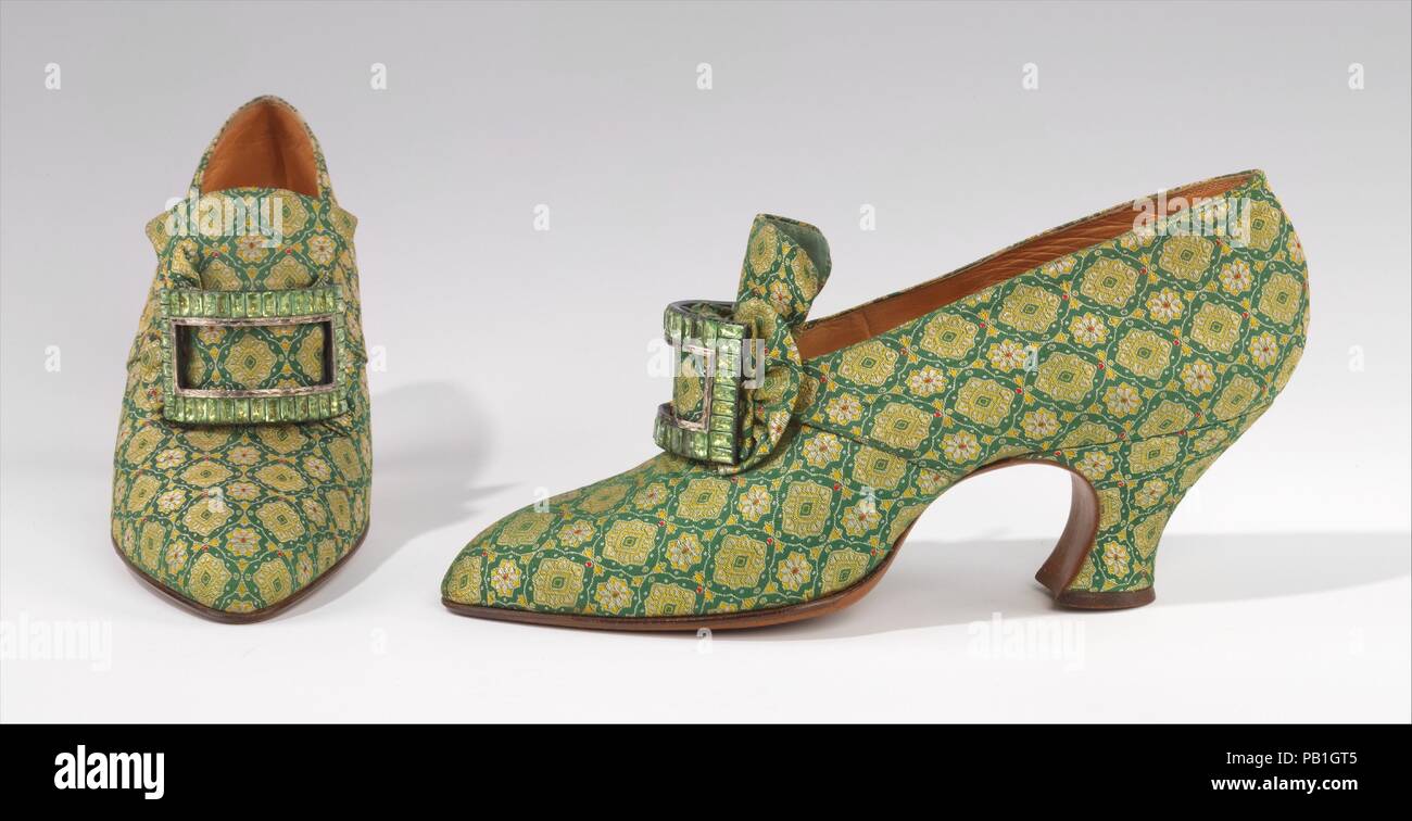 Evening pumps. Culture: French. Designer: Pierre Yantorny (Italian, 1874-1936). Date: 1925-30.  Pietro Yantorny (1874-1936), the self-proclaimed 'most expensive shoemaker in the world', was a consummate craftsman utterly devoted to the art of shoemaking.  Yantorny sought to create the most perfectly crafted shoes possible for a select and exclusive clientele of the most perfectly dressed people. While Yantorny's shoes are best know from the surviving examples created for Lydia de Acosta Lydig (1880-1929) in her favored antique velvets and laces, this pair of colonial pumps shows a refreshingly Stock Photo
