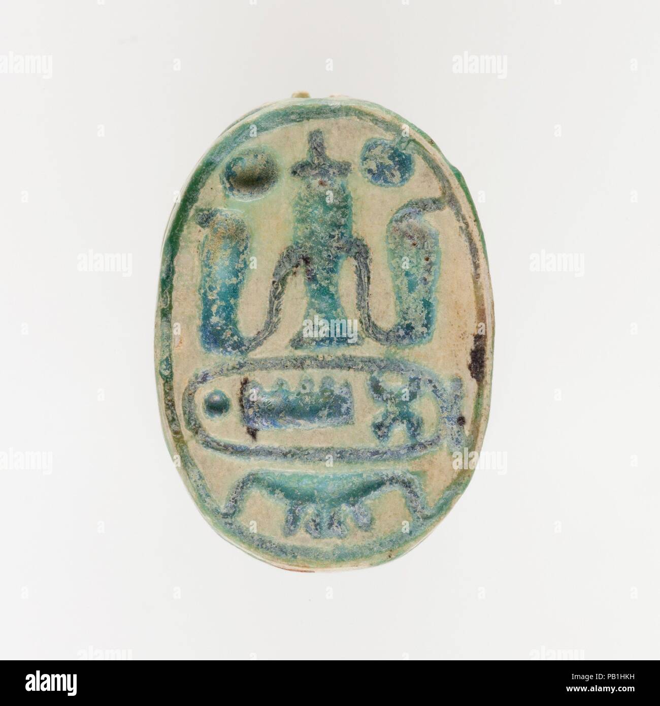 Scarab of Thutmose III. Dimensions: L. 1.7 × W. 1.2 × H. 0.9 cm (11/16 × 1/2 × 3/8 in.). Dynasty: Dynasty 18. Date: ca. 1550-1295 B.C.. Museum: Metropolitan Museum of Art, New York, USA. Stock Photo