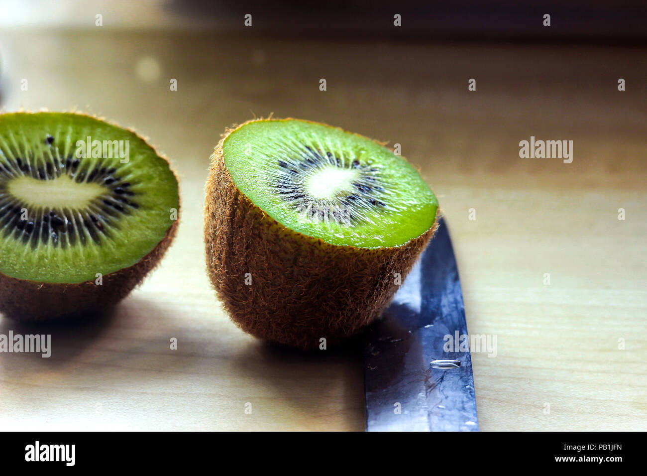 Freshly cut kiwi Stock Photo