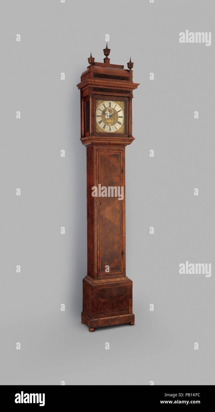 Longcase clock with calendar. Culture: British, London. Dimensions: Overall: 94 × 19 × 10 1/2 in. (238.8 × 48.3 × 26.7 cm). Maker: Clockmaker: Thomas Tompion (British, 1639-1713). Date: ca. 1700.  This eight-day clock with anchor escapement and 11.4 seconds-beating pendulum is numbered 344. Although the seconds-beating long pendulum (approximately 39 inches in length) became standard for longcase clocks in the late seventeenth century, a few clockmakers experimented with longer pendulums. It proved remarkably difficult, however, to make them reliable, and only the best English clockmakers were Stock Photo