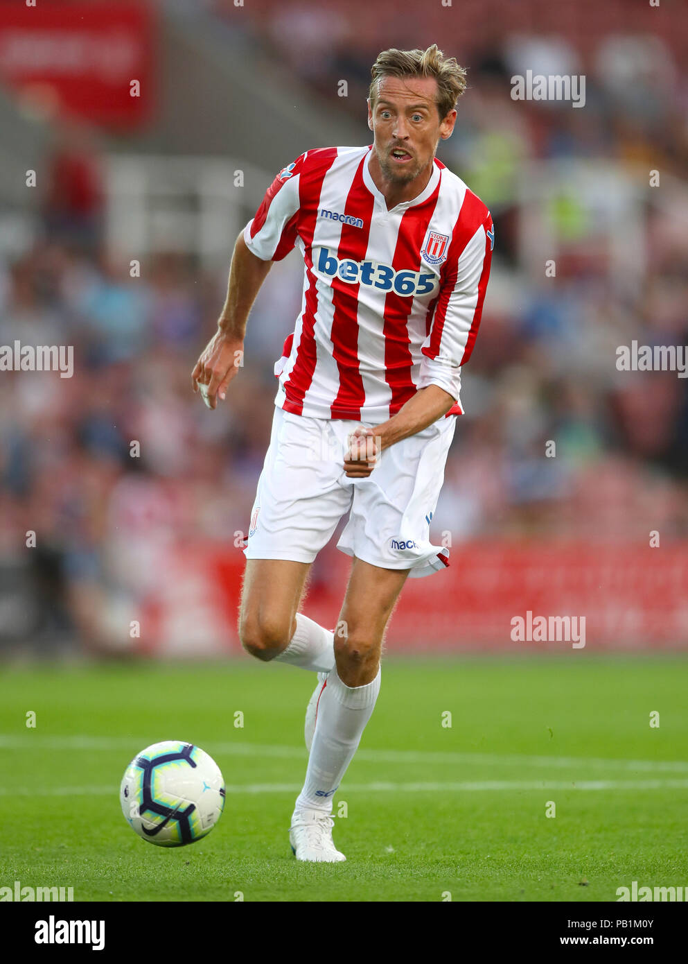 Stoke City's Peter Crouch during a pre season friendly match at The Bet365 Stadium, Stoke. PRESS ASSOCIATION Photo. Picture date: Wednesday July 25, 2018. Photo credit should read: Nick Potts/PA Wire. EDITORIAL USE ONLY No use with unauthorised audio, video, data, fixture lists, club/league logos or 'live' services. Online in-match use limited to 75 images, no video emulation. No use in betting, games or single club/league/player publications. Stock Photo