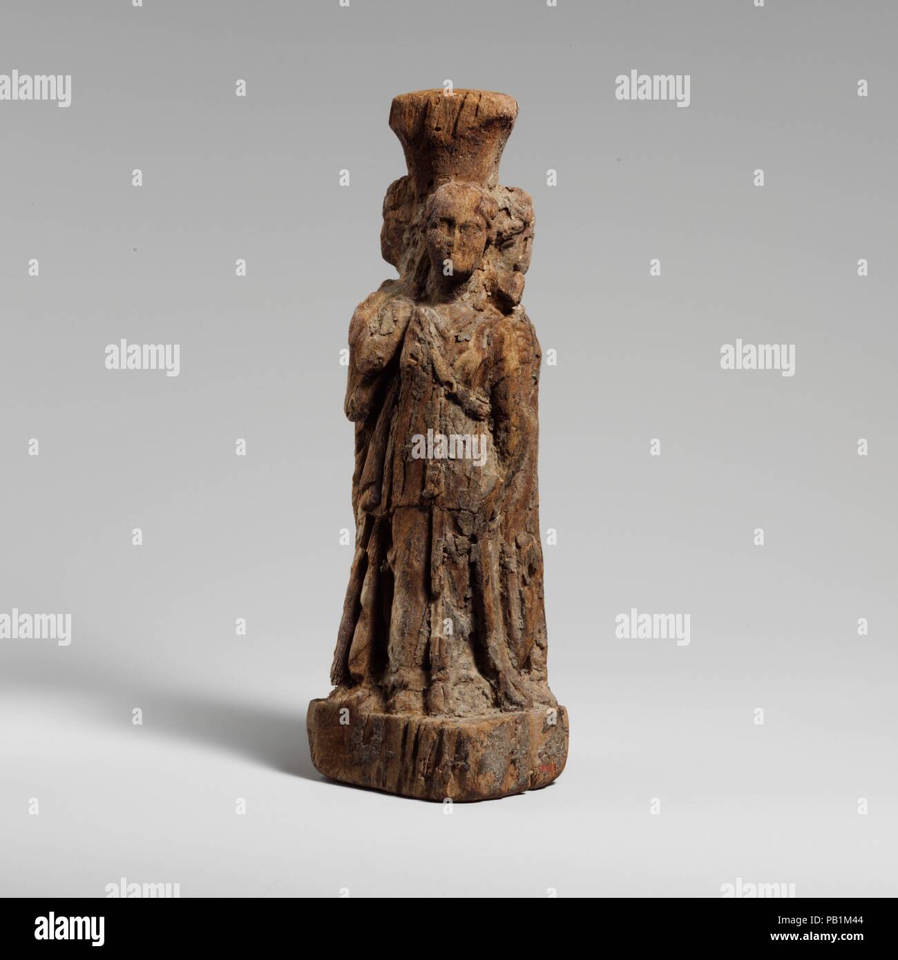 Wood statuette of Hekate. Culture: Egyptian, Ptolemaic. Dimensions: H.: 9 3/16 in. (23.4 cm). Date: 304-30 B.C..  Carved out of juniper wood, the statuette was originally painted. Museum: Metropolitan Museum of Art, New York, USA. Stock Photo