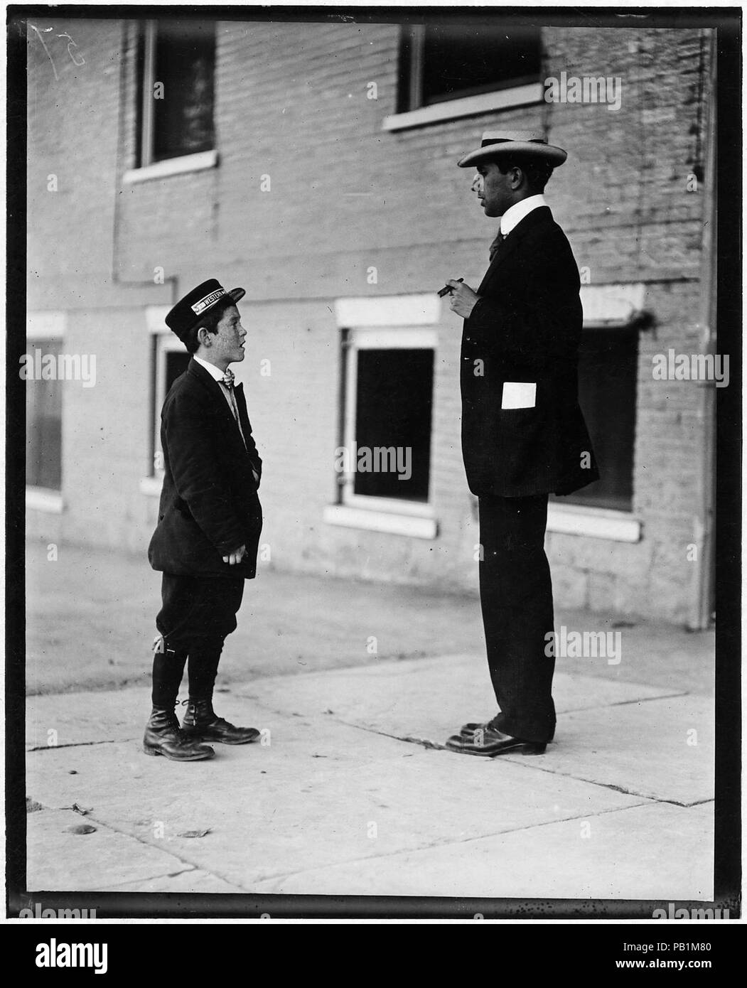 A.D.T. boy, 13 years old. 1 1-2 years at it. Works from noon till 10-30 P.M. Said he carries notes, etc. Burlington, Vt. - Stock Photo