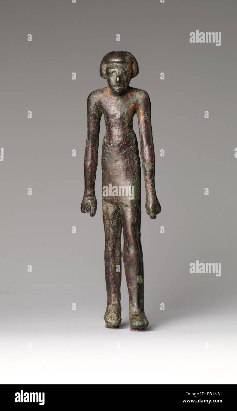 Striding Man. Dimensions: H. 14 × W. 4.2 × D. 2.4 cm (5 1/2 × 1 5/8 × 15/16  in.). Dynasty: Dynasty 8-12. Date: ca. 2100-1950 B.C.. A few examples of  copper