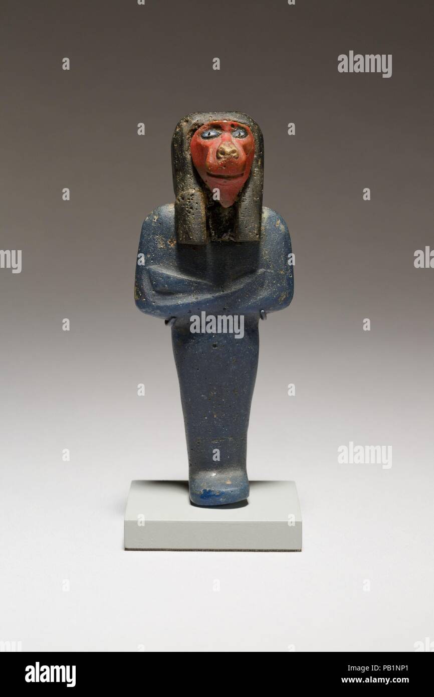 Funerary figure of Hapy. Dimensions: H. 8.2 × W. 3.2 × D. 2.6 cm (3 1/4 × 1 1/4 × 1 in.). Date: 1100-332 BC.  These elaborate composite glass figures of the Four Sons of Horus also show traces of gilding.   The date of the figures is quite uncertain. They are likely to be pre-Ptolemaic given the strongly sectional use of color, but until a careful study is done of the style of such figures through time more cannot be said with any certainty. Museum: Metropolitan Museum of Art, New York, USA. Stock Photo