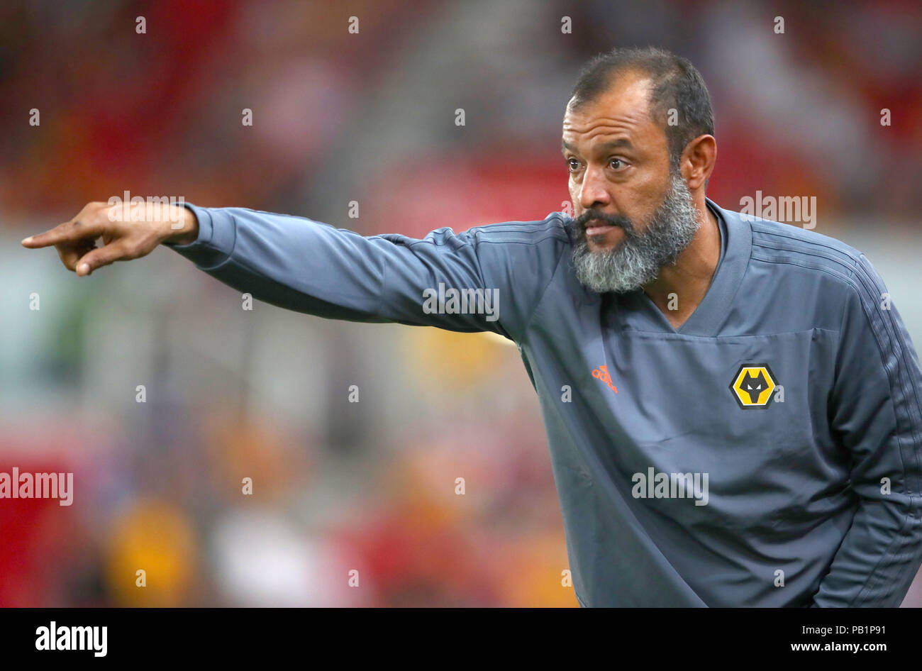 Wolverhampton Wanderers Manager Nuno EspÃ­rito Santo gestures during a pre season friendly match at The Bet365 Stadium, Stoke. PRESS ASSOCIATION Photo. Picture date: Wednesday July 25, 2018. Photo credit should read: Nick Potts/PA Wire. EDITORIAL USE ONLY No use with unauthorised audio, video, data, fixture lists, club/league logos or "live" services. Online in-match use limited to 75 images, no video emulation. No use in betting, games or single club/league/player publications. Stock Photo