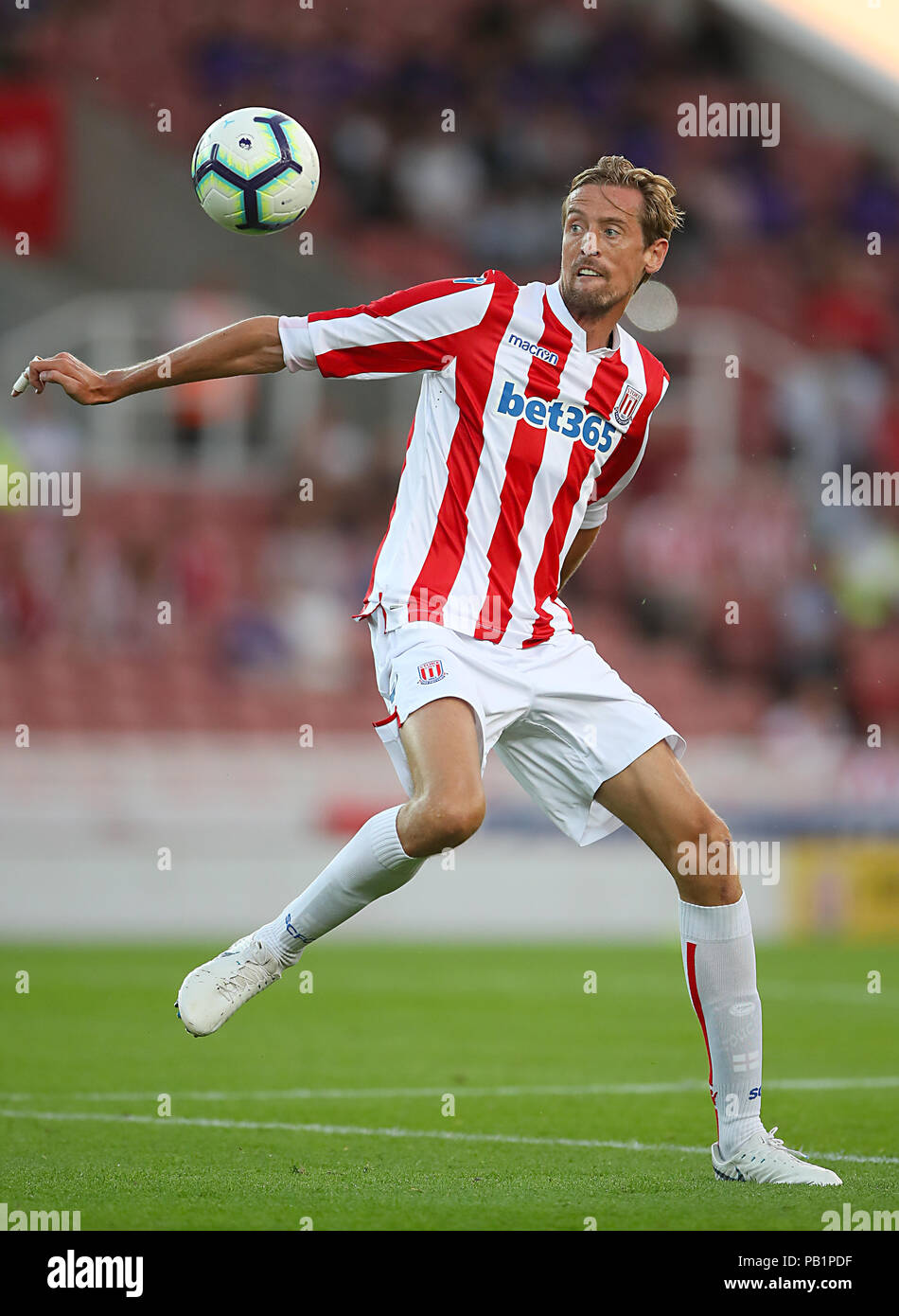Stoke City's Peter Crouch during a pre season friendly match at The Bet365 Stadium, Stoke. PRESS ASSOCIATION Photo. Picture date: Wednesday July 25, 2018. Photo credit should read: Nick Potts/PA Wire. No use with unauthorised audio, video, data, fixture lists, club/league logos or 'live' services. Online in-match use limited to 75 images, no video emulation. No use in betting, games or single club/league/player publications. Stock Photo