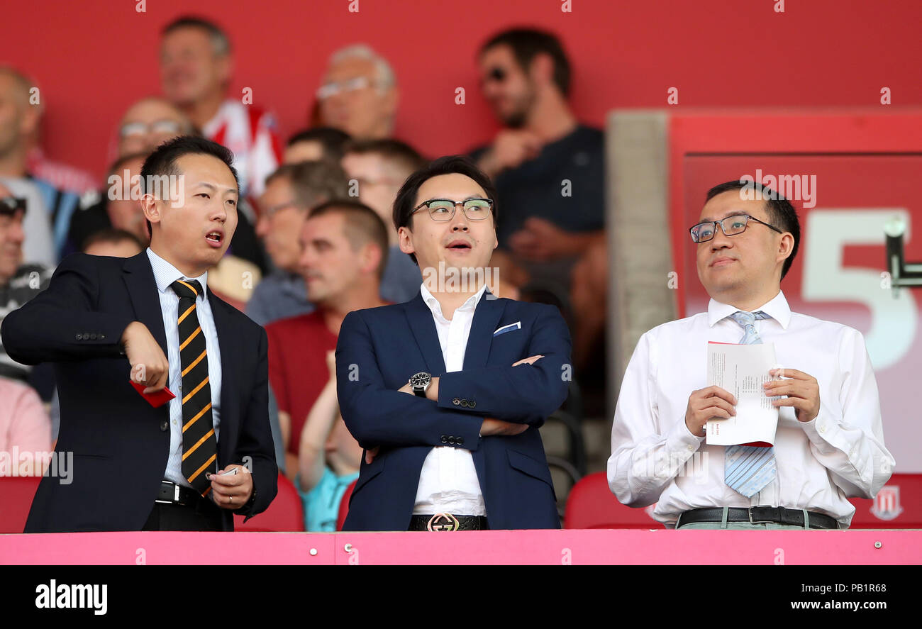 Wolverhampton Wanderers Owner Jeff Shi (right) with  Fosun Group Consultant Sky Sun (centre) during a pre season friendly match at The Bet365 Stadium, Stoke. PRESS ASSOCIATION Photo. Picture date: Wednesday July 25, 2018. Photo credit should read: Nick Potts/PA Wire. EDITORIAL USE ONLY No use with unauthorised audio, video, data, fixture lists, club/league logos or 'live' services. Online in-match use limited to 75 images, no video emulation. No use in betting, games or single club/league/player publications. Stock Photo