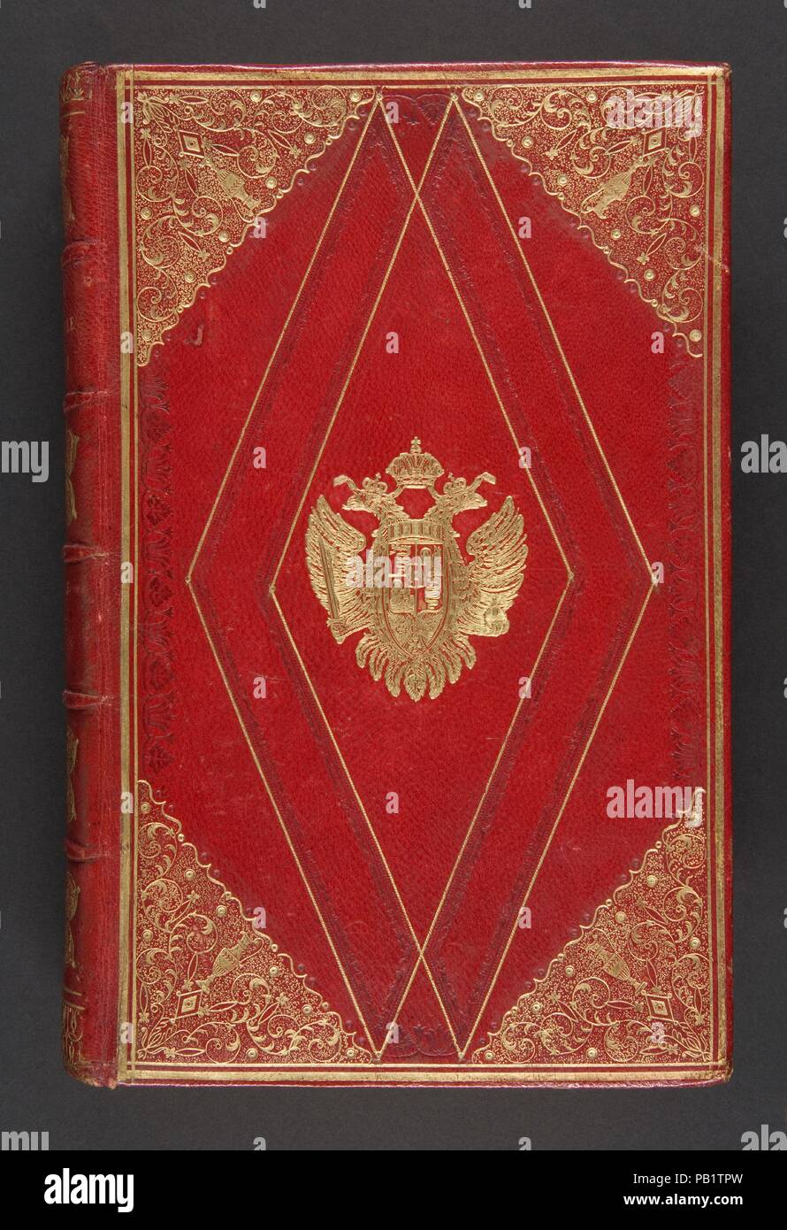 Codice civile generale austriaco. Binder: Luigi Lodigiani (Italian, 1778-1843). Dimensions: Length: 9 13/16 in. (25 cm). Date: 1815.  Contemporary red morocco gold- and blind-tolled binding with large corners with a floral motif and central armorial stamps of Francis I, Emperor of Austria (1768-1835) framed by a double-diamond motif; blue silk doublures.  This presentation binding was bound by Lodigiani of Milan (1777-1843), the greatest Italian bookbinder of his time. Signed at foot of spine 'Lodisiana (six)/Rel.'. Museum: Metropolitan Museum of Art, New York, USA. Stock Photo