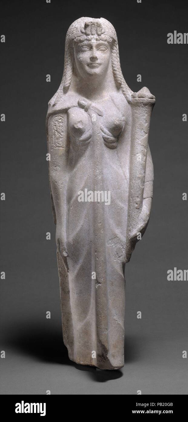 Statue of a Ptolemaic Queen, perhaps Cleopatra VII. Dimensions: H. 62.5 cm (24 5/8 in.); W. 22 cm (8 11/16 in.); D. 15 cm (5 7/8 in.). Dynasty: Ptolemaic Dynasty. Date: 200-30 B.C..  The statue represents a Ptolemaic queen holding a cornucopia. Attributes and dress point to a date in the second or first century B.C., and one recent study notes that details of the queen's hairstyle suggest identification with Cleopatra VII. However, the cartouche actually reading 'Cleopatra' on this statue's arm would be a highly unusual occurrence, and is, moreover, incorrectly oriented, so that it is probably Stock Photo