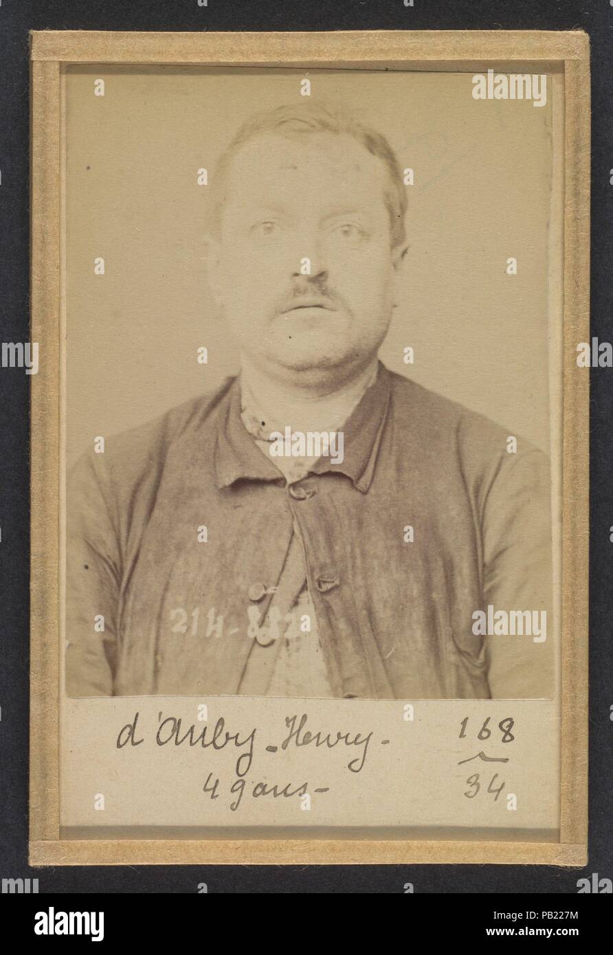 D'Auby. Henri. 48 (ou 49) ans, né à Montmédy (Meuse). Menuisier. Anarchiste. 28/2/94. Artist: Alphonse Bertillon (French, 1853-1914). Dimensions: 10.5 x 7 x 0.5 cm (4 1/8 x 2 3/4 x 3/16 in.) each. Date: 1894.  Born into a distinguished family of scientists and statisticians, Bertillon began his career as a clerk in the Identification Bureau of the Paris Prefecture of Police in 1879. Tasked with maintaining reliable police records of offenders, he developed the first modern system of criminal identification. The system, which became known as Bertillonage, had three components: anthropometric me Stock Photo