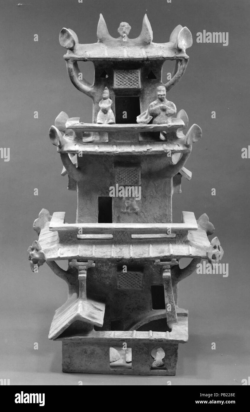 Multistoried Watchtower with Front Court. Culture: China. Dimensions: H. 33 1/4 in. (84.5 cm); W. 18 1/8 in. (46 cm). Date: ca. 1st-early 3rd century.  Pottery models of houses and farm structures were commonly included in Eastern Han burials to provide for the afterlife. Museum: Metropolitan Museum of Art, New York, USA. Stock Photo