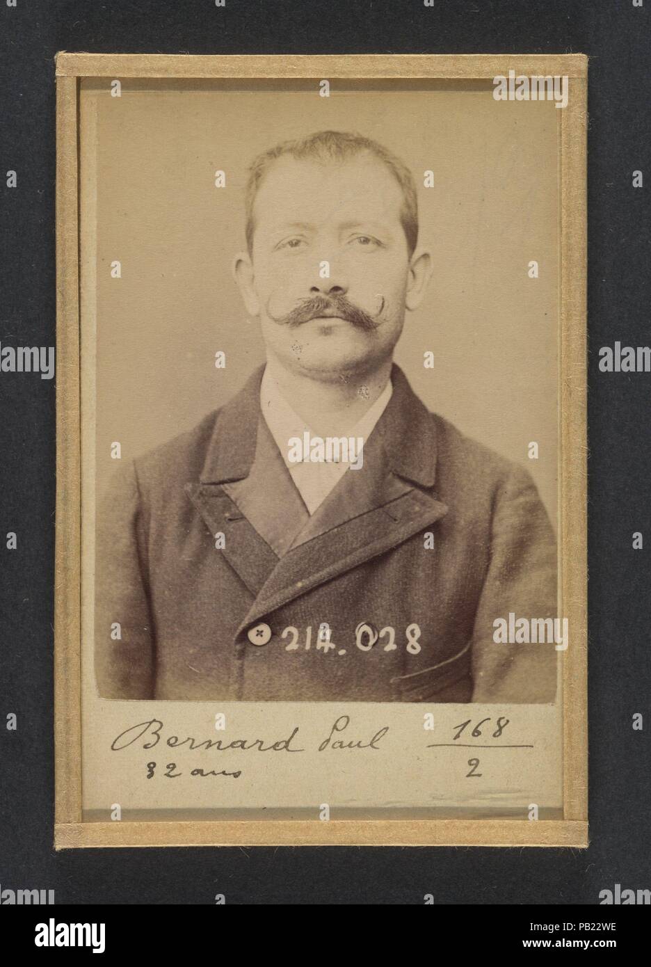 Bernard. Paul, Auguste. 32 ans, né à Crest (Drôme). Employé. Excitation au meurtre, anarchiste. 11/2/94. Artist: Alphonse Bertillon (French, 1853-1914). Dimensions: 10.5 x 7 x 0.5 cm (4 1/8 x 2 3/4 x 3/16 in.) each. Date: 1894.  Born into a distinguished family of scientists and statisticians, Bertillon began his career as a clerk in the Identification Bureau of the Paris Prefecture of Police in 1879. Tasked with maintaining reliable police records of offenders, he developed the first modern system of criminal identification. The system, which became known as Bertillonage, had three components Stock Photo