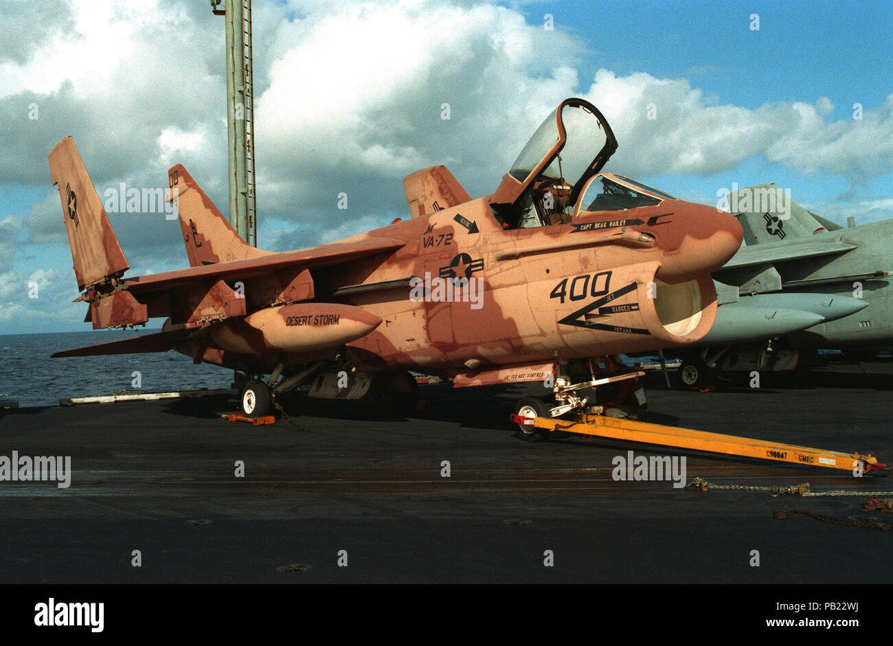 A-7E VA-72 in special camouflage on USS Kennedy (CV-67) 1990. An Attack Squadron 72 (VA-72) A-7E Corsair aircraft bearing a desert camouflage paint scheme sits on the flight deck of the aircraft carrier USS JOHN F. KENNEDY (CV-67) following the cease-fire that ended  Operation Desert Storm.  The aircraft is assigned to the commander and deputy commander of Carrier Air Wing 3 (CVW-3). Stock Photo