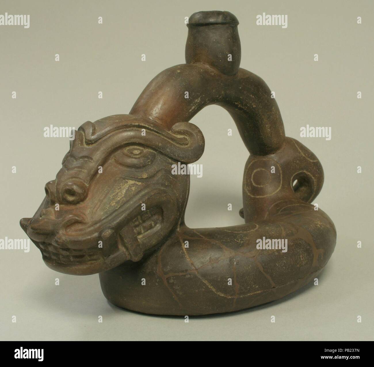 Stirrup Spout Bottle: Serpent. Culture: Cupisnique. Dimensions: Height 8 in. (20.3 cm). Date: 12th-5th century B.C.. Museum: Metropolitan Museum of Art, New York, USA. Stock Photo
