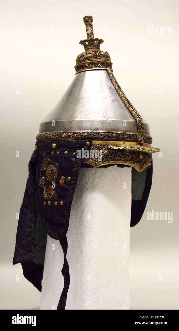 Armor. Culture: Chinese. Dimensions: Helmet (a); H. including nape defense 20 3/4 in. (52.7 cm); H. excluding nape defense 11 1/4 in. (28.6 cm); W. 8 1/4 in. (21 cm); D. 10 in. (25.4 cm); Wt. 3 lb. 14.3 oz. (1766.2 g). Date: 18th century. Museum: Metropolitan Museum of Art, New York, USA. Stock Photo