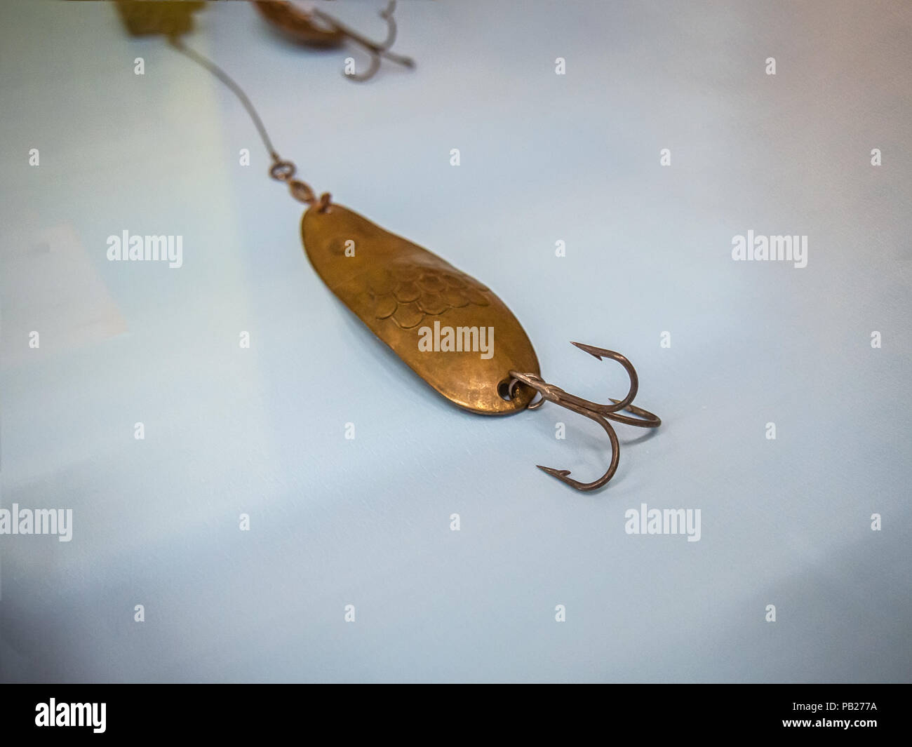 Vintage bronze Fishing lure Stock Photo Alamy