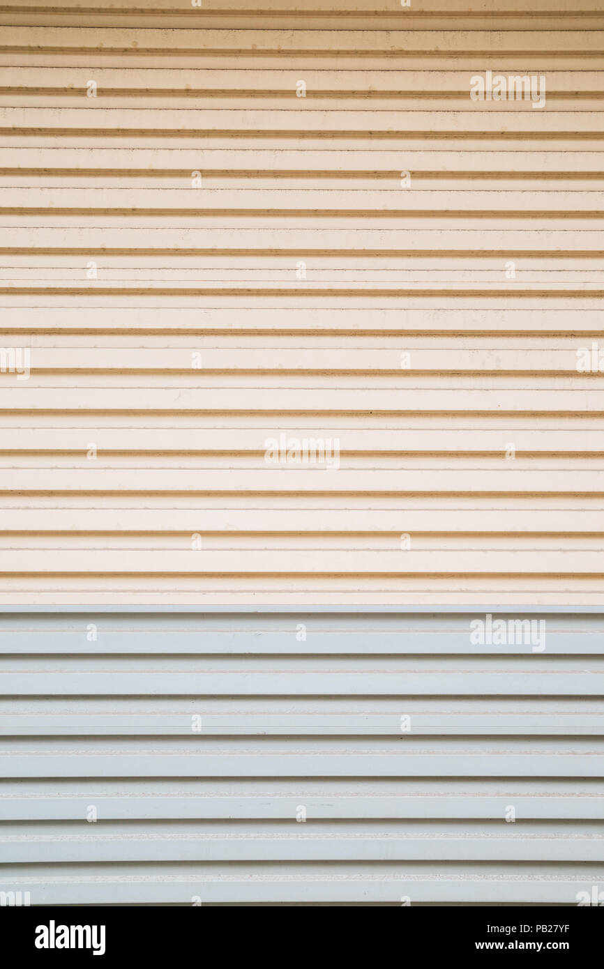 Beige and gray color shutter door background Stock Photo