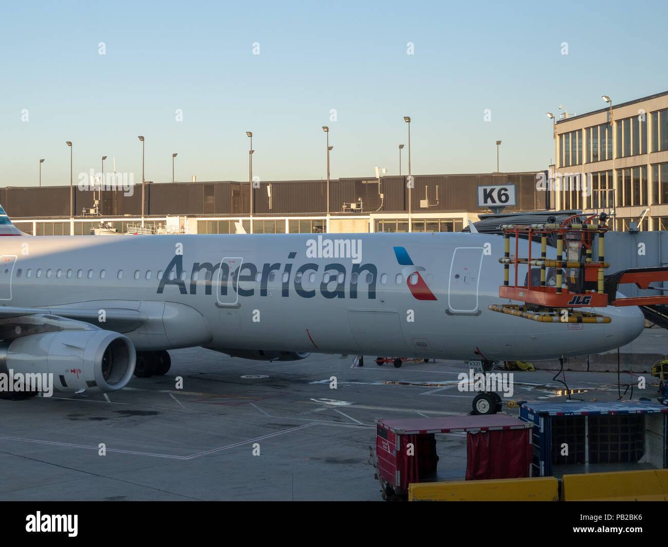 An American Airlines plane refuels at a terminal at San Francisco International Airport SFO  Stock Photo