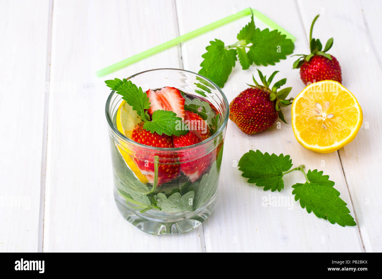 Fruity drink refreshing on white wooden table Stock Photo