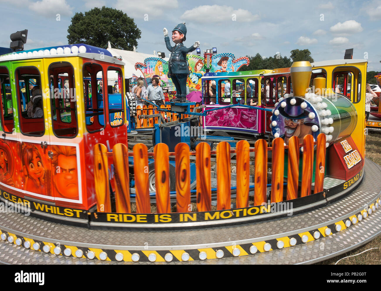 A Small Train Carousel or Roundabout for Child Rides at Nantwich Agricultural Show Cheshire England United Kingdom UK Stock Photo