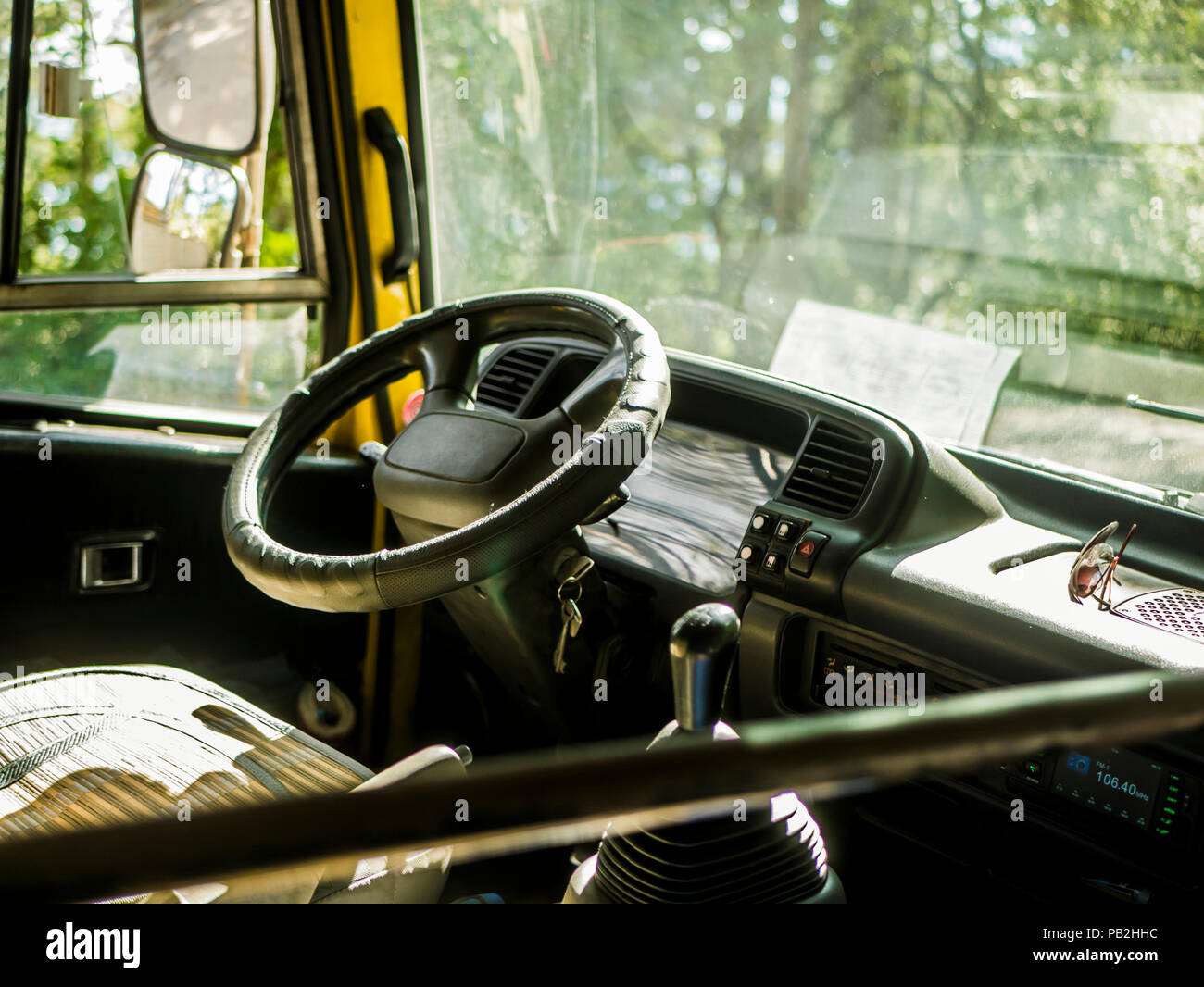 empty bus driver seat cabin interior close up shot Stock Photo - Alamy